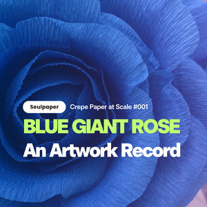 Close-up of a large deep blue crepe paper rose with layered ruffled petals, a Seulpaper artwork record titled Blue Giant Rose